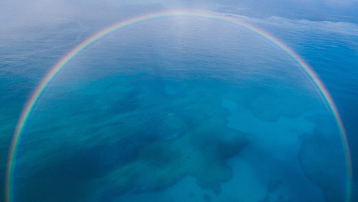 image of rainbow above sea