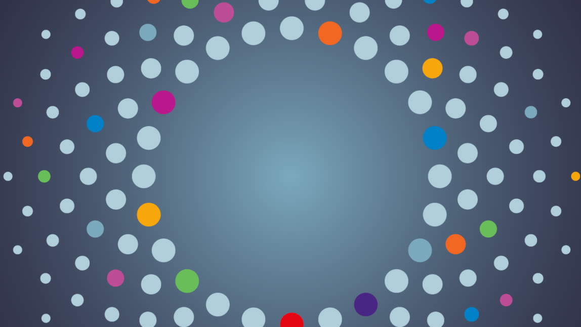 Colourful dots on a grey background. 