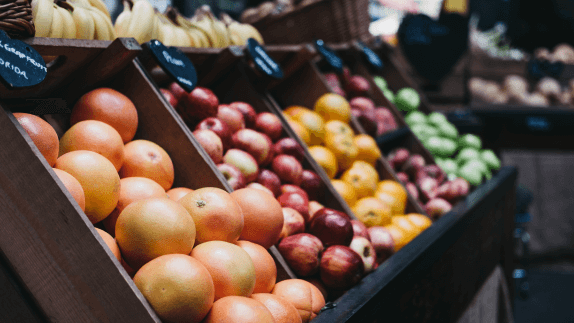 Supermarket baskets with fruit